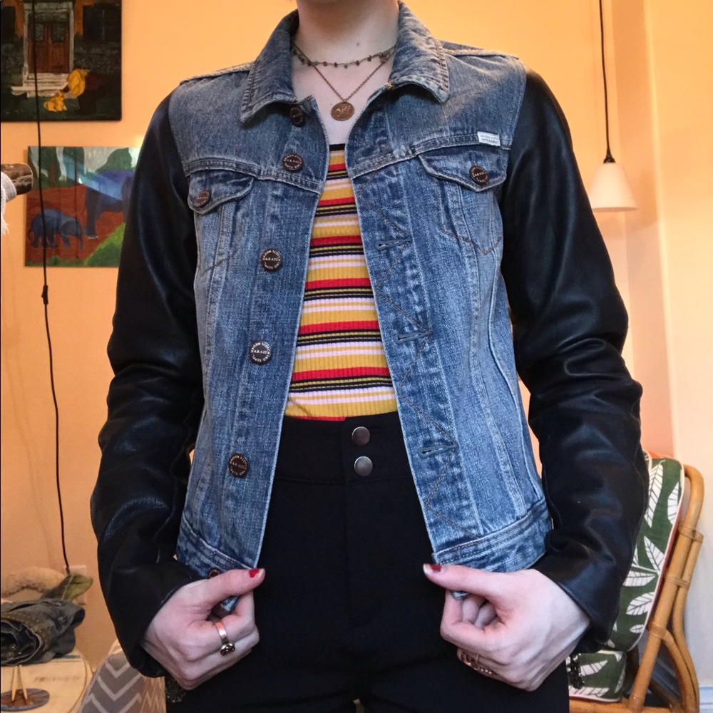 Vintage denim jacket with leather sleeves